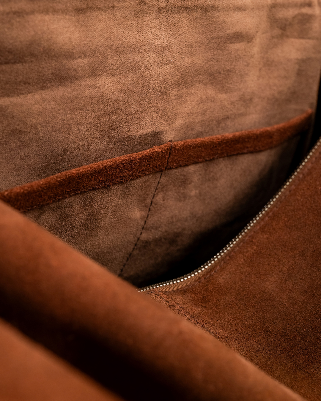 the edgy kind bag — brown suede